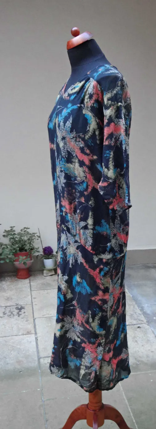 1920s or 30s dress in abstract printed silk. Lovely, wearable condition and a good size.