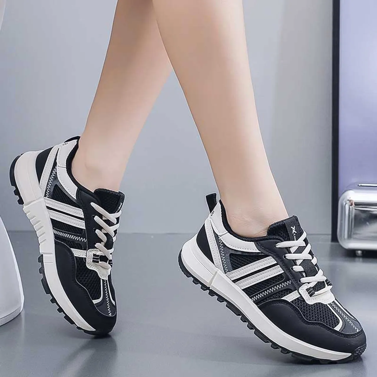 Black stripe wave accents casual shoe sneaker