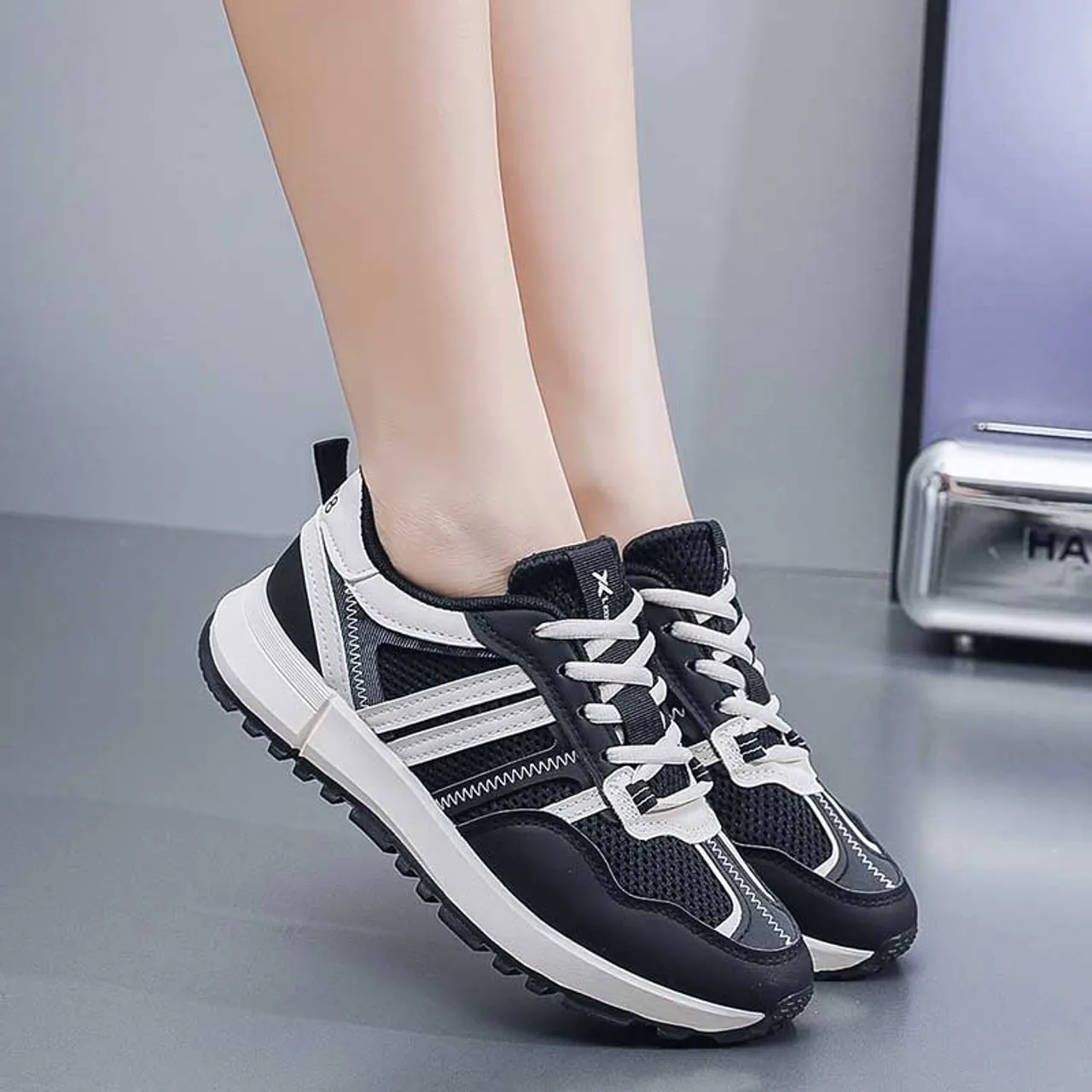 Black stripe wave accents casual shoe sneaker