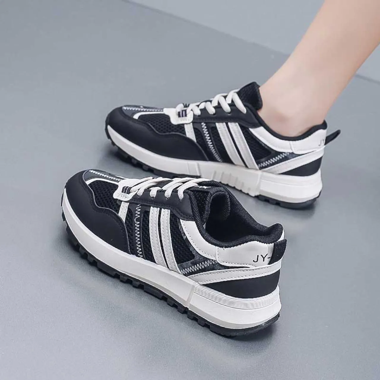 Black stripe wave accents casual shoe sneaker