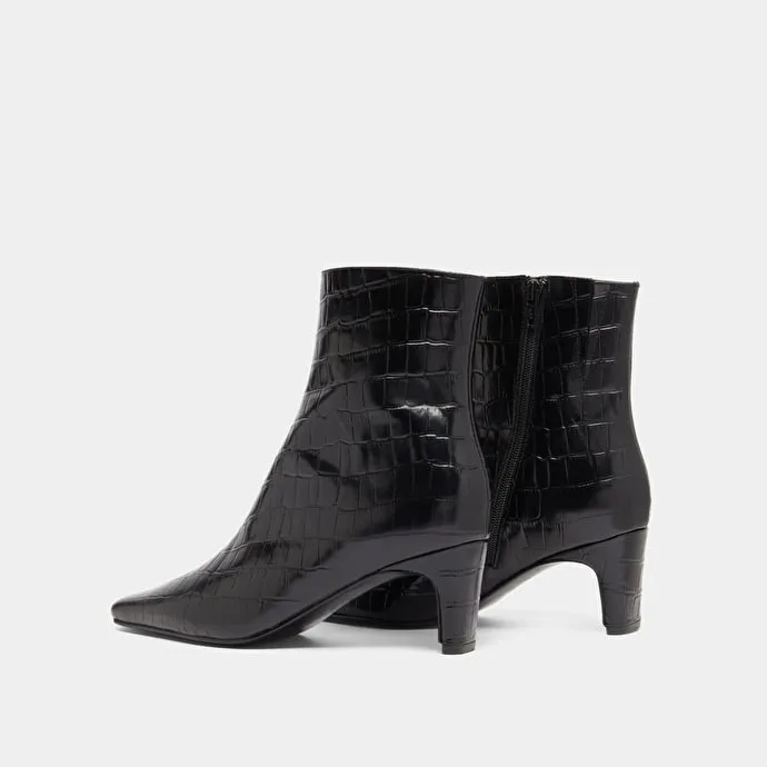 Pointed-toe ankle boots in black reptile leather